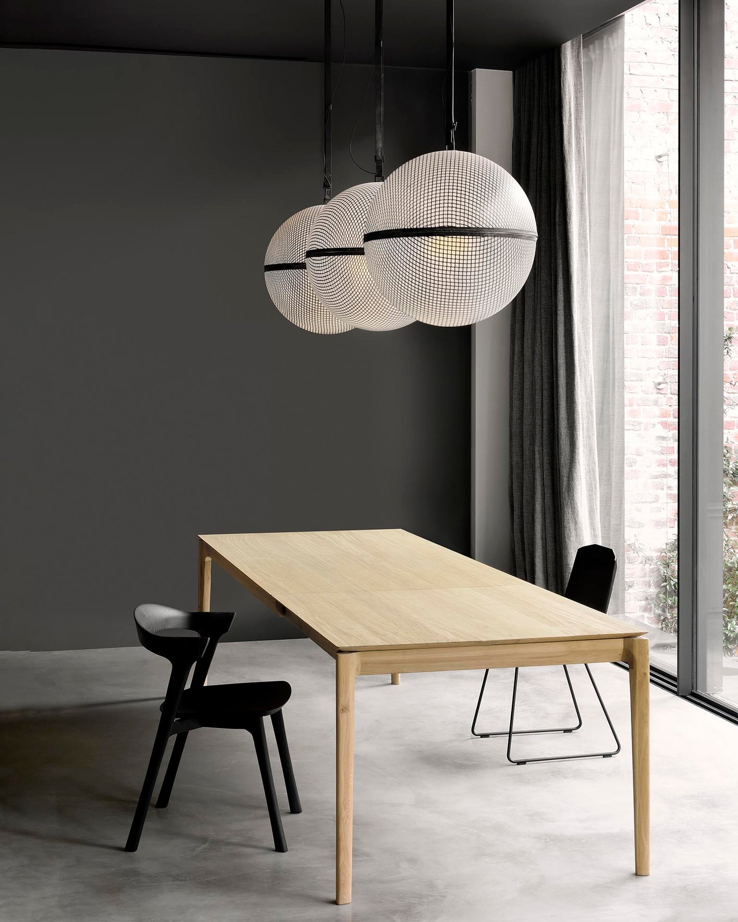 Solid oak expandable dining table for hospitality seating
