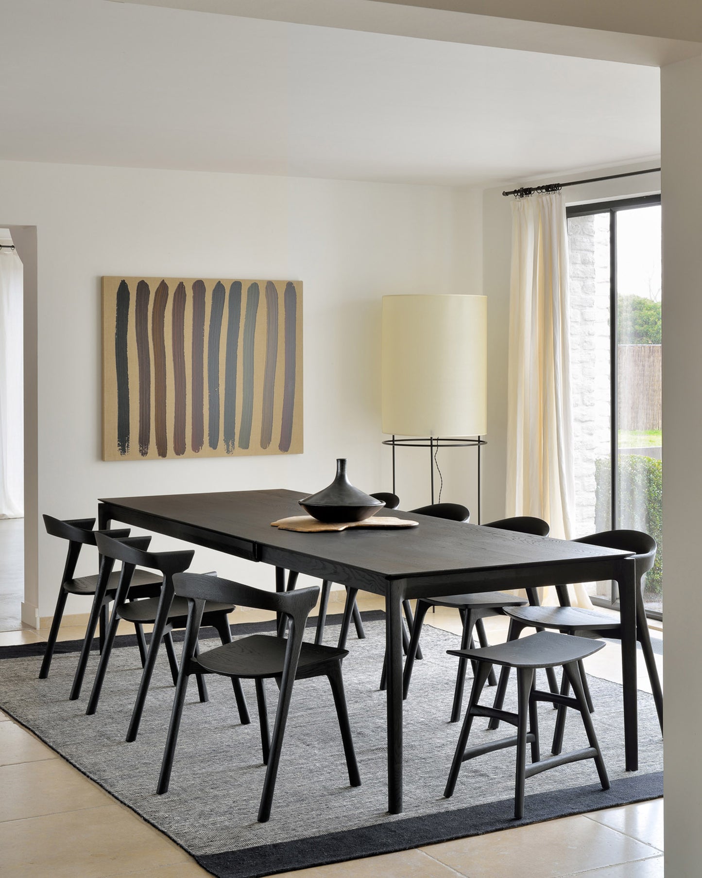 Oak-black-Bok-extendable-dining-table-chair-Osso-stool-Black-Dots-kilim-rug-Goode-Studio