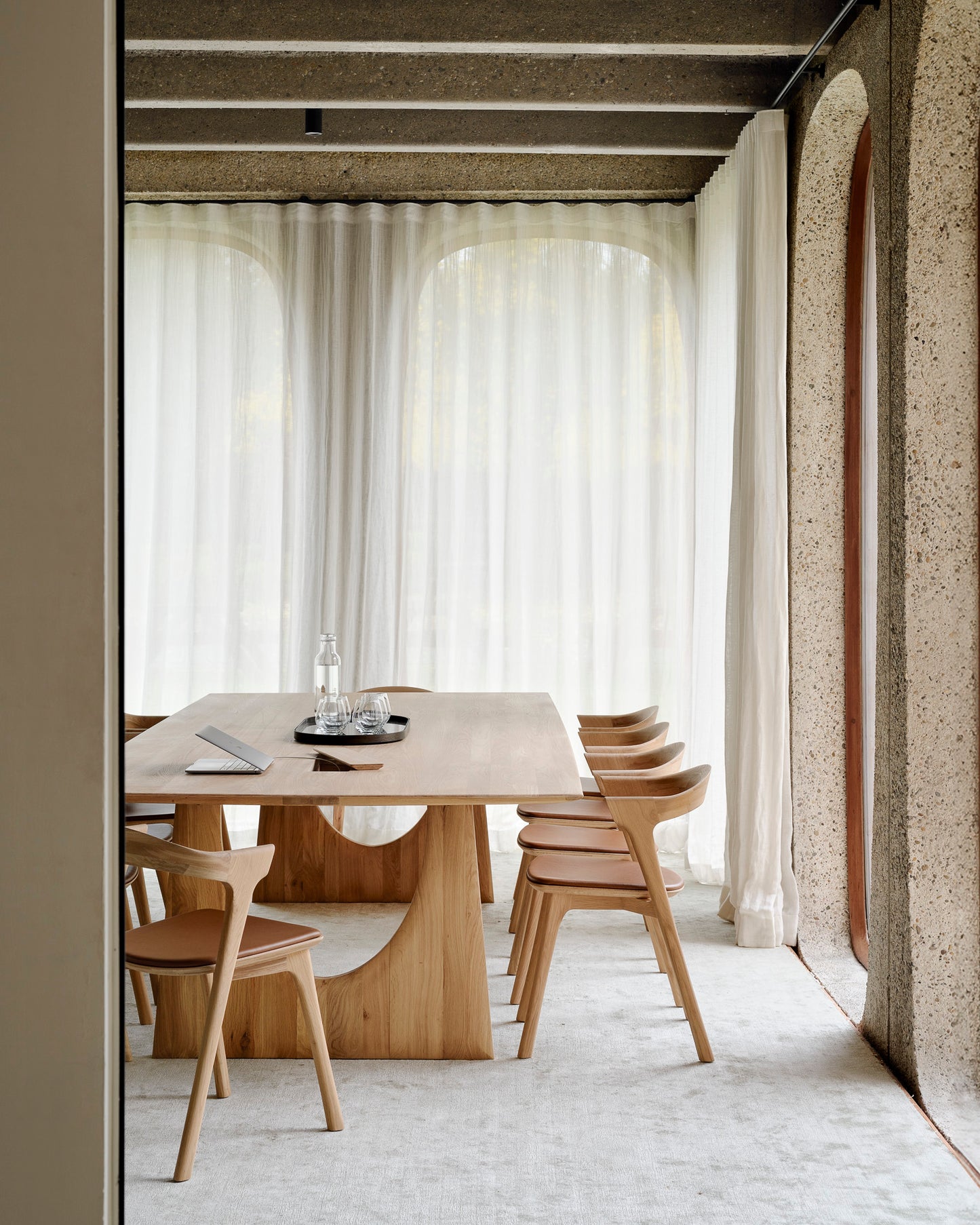 Geometric-meeting-table-Bok-dining-chair-oak-cognac-leather-Aged-mirror-tray-laptop-Goode-Studio
