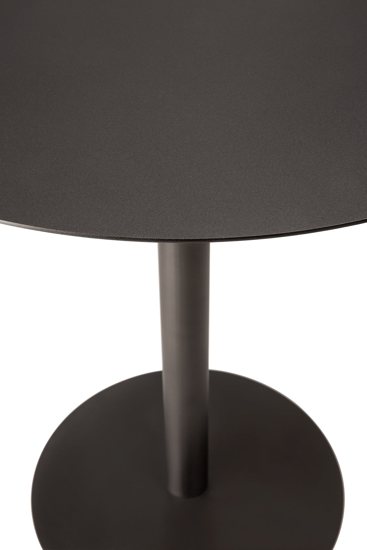 Close-up of a black table with a simple design.