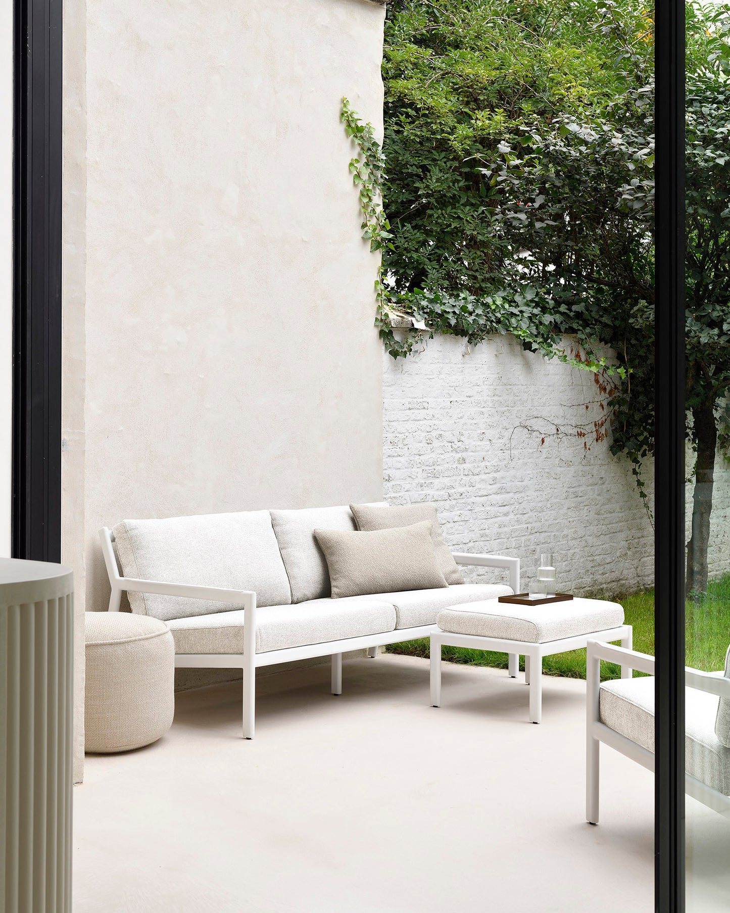 Jack-alu-2-seater-Jack-lounge-chair-Jack-footstool-off-white-Donut-pouf-natural-Goode-Studio