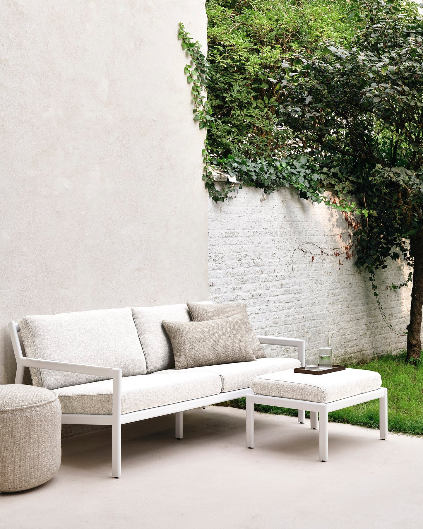 Jack-outdoor-sofa-alu-2-seater-Jack-footstool-off-white-Donut-pouf-natural-Goode-Studio